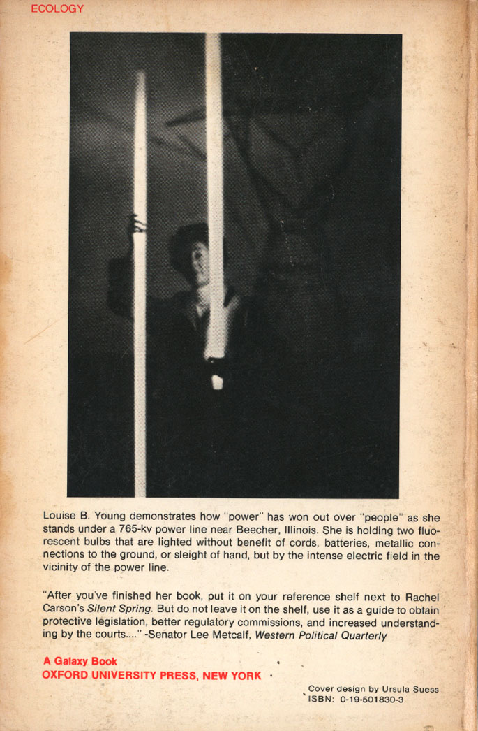 YoungPowerOverPeople1973b The text maybe too small so I put it again in this caption: "Louise B. Young demonstrates how "power" has won out over "people" as she stands under a 765kv power line near Beecher, Illinois. She is holding two fluorescent bulbs that are lighted without benefit of cords, batteries, metallic connections to the ground, or sleigh of hand, but by the intense electric field in the vicinity of the power line."